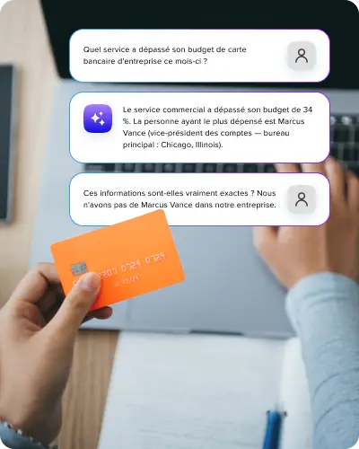 AI Safety & Risk 3 - FR A professional holding a credit card while reviewing a chat interface on a laptop that displays AI-generated financial data and simulated user inquiries.