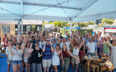 A group photograph of many different Applause employees, all enjoying an outdoor activity together.
