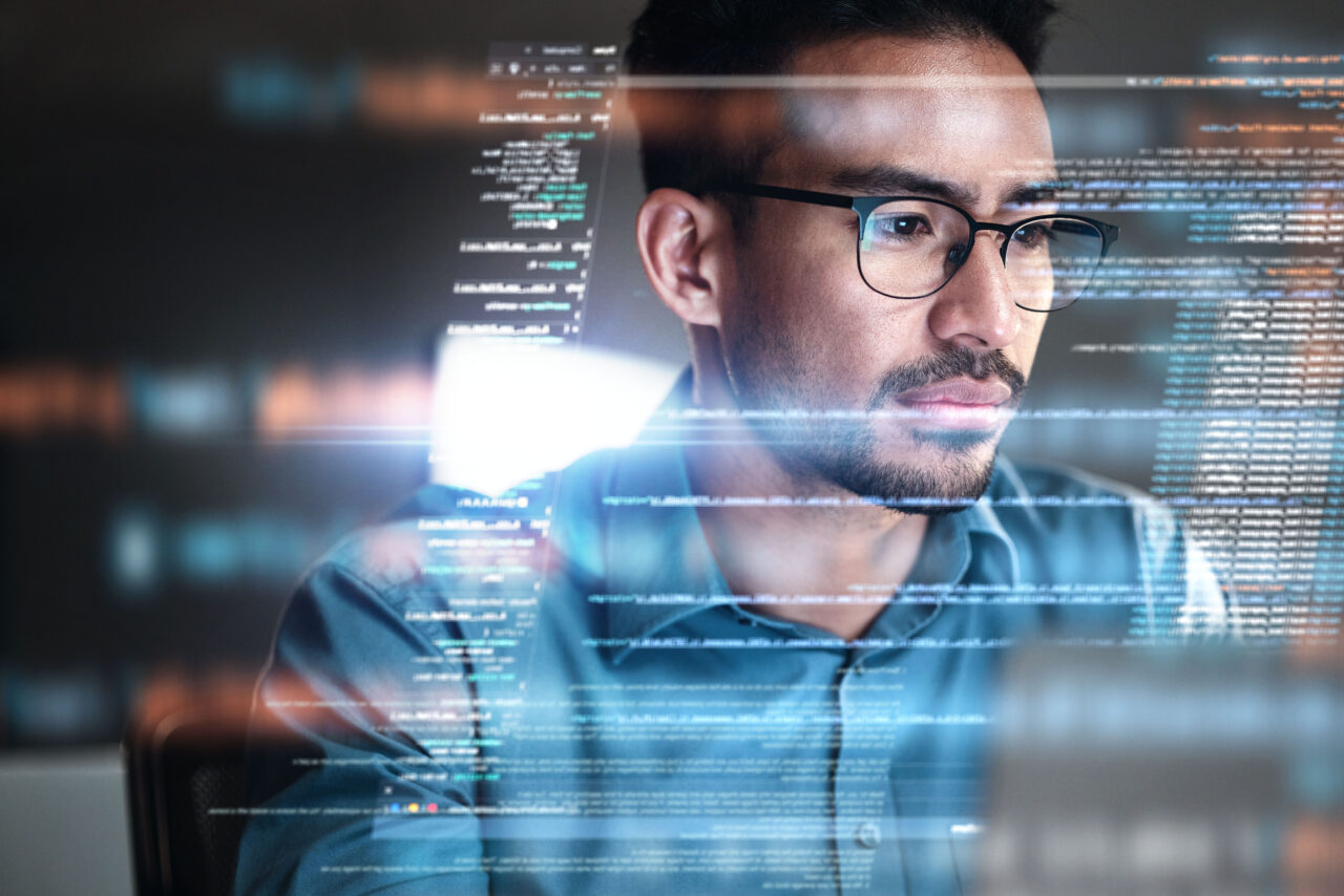 software programmer running test automation