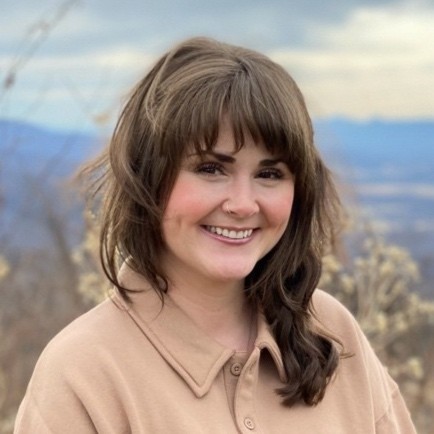 Image of Sam Silver, middle-aged white woman with brunette, shoulder-length hair.