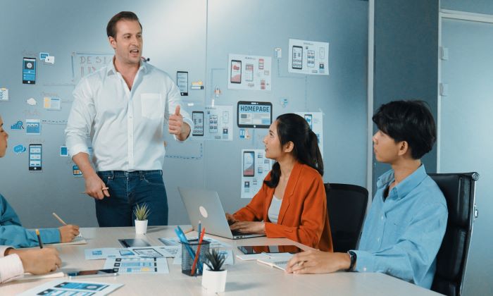 UX researchers decide how to condust a study on a product their company has acquired.