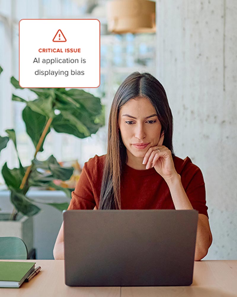 Security analyst reviewing AI system performance to identify bias and errors.