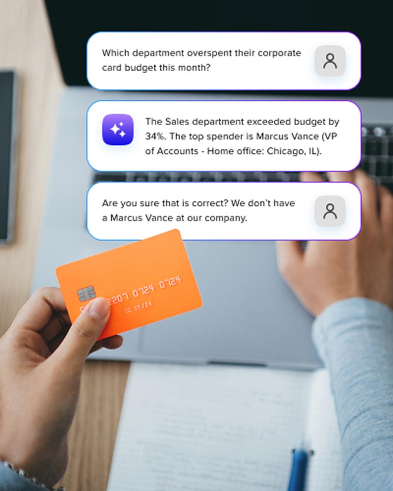 A professional holding a credit card while reviewing a chat interface on a laptop that displays AI-generated financial data and simulated user inquiries.